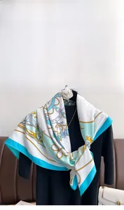 Detail of nautical twill silk scarf with anchor and helm patterns on mannequin