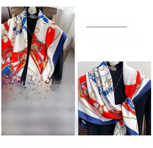 Detail of nautical silk scarf featuring anchors and chains with premium hand-rolled edges