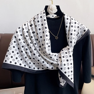 Polka dot silk scarf for women in black and white with elegant border and glossy finish