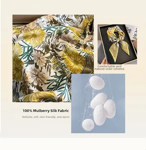 Macro detail of floral mulberry silk scarf with vintage chrysanthemums and gift box