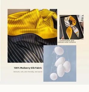 Detail of 100% mulberry silk scarf showing elegant stripe patterns and smooth texture