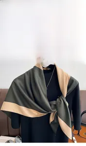 Detail of elegant two-tone silk scarf with satin luster on twill weave fabric