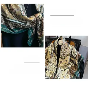 Close-up of vintage paisley silk scarf with refined lock-stitch edges and floral pattern