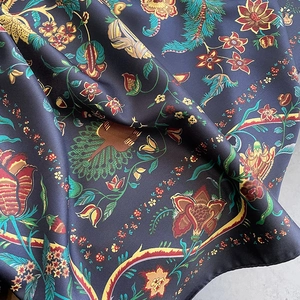 Vintage floral silk scarf with peacock pattern and intricate botanical prints on navy background