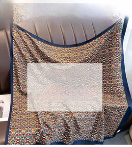 Detail of bohemian geometric print silk scarf made of high-quality twill fabric