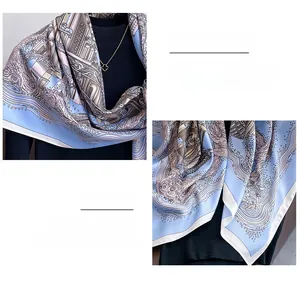Detailed view of 90cm square silk scarf featuring classical architecture and ocean wave print