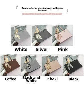 Detail view of woven tote bags in multiple colors featuring decorative star print scarves
