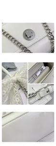 Vue détaillée du sac en cuir blanc avec chaîne argentée et nœud en dentelle