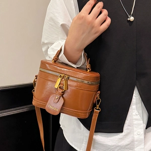 Retro brown leather vanity box bag with golden double zipper and elegant top handle