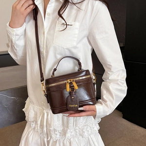 Retro dark brown box-style crossbody bag with gold hardware and top handle for women