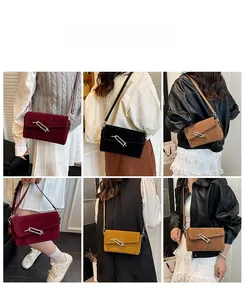 Detailed views of crossbody bags with rectangular buckles in four different colors