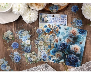 Detailed view of blue rose PET stickers with gold foil accents for journaling and DIY