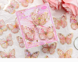Detail of pink PET butterfly stickers with laser gold foil stamping and semi-transparent wings