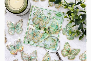 Detail of laser gold foil butterfly stickers set for scrapbooking with waterproof PET material