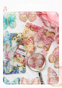 Detailed laser gold foil butterfly stickers featuring 3D effect on waterproof PET material