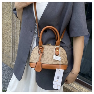 Borsa a mano vintage con monogramma e tracolla regolabile in vista esterna