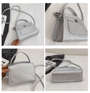 Detailed views of silver sequin handbag with wave texture, metal lock, and detachable strap