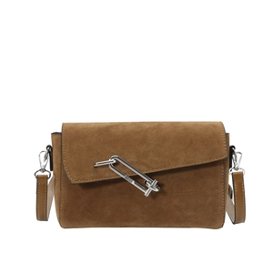 Brown suede crossbody bag with stylish silver paperclip clasp and leather strap