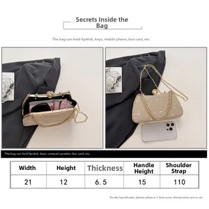 Size guide for a champagne gold evening clutch bag with pearl clasp and chain strap