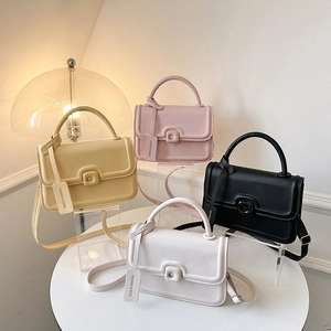 Minimalist square crossbody bags in beige, pink, black, and white with push-lock closure