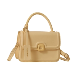 Chic beige leather handbag with square buckle and adjustable shoulder strap for women