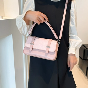Vintage light pink crossbody bag with woven handle and plaid texture for women