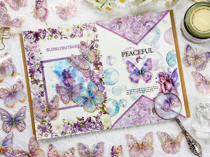 Detailed view of laser gold foil butterfly and floral stickers with translucent PET texture