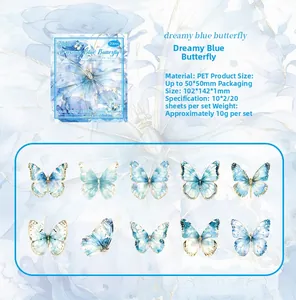 Detail view of butterfly PET stickers with gold foil edges for scrapbooking