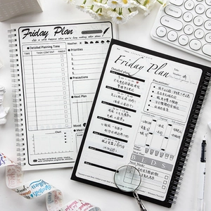 Planner giornaliero a spirale bianco e nero con orario 24 ore e monitoraggio obiettivi