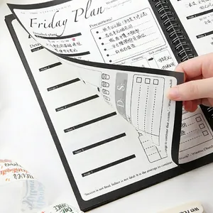 Agenda A5 nera a spirale con pagine di pianificazione del venerdì e tracciamento compiti
