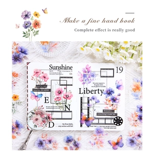 Macro detail of vintage floral and butterfly stickers for DIY scrapbooking decoration