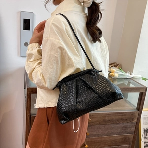 Chic black woven shell shoulder bag with cloud shape and geometric texture