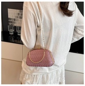 Pink sequin evening clutch bag with crystal buckle and elegant gold chain strap