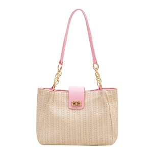 Beige woven straw tote bag with pink straps and golden metal turn-lock closure