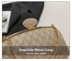 Detail of elegant gold evening clutch bag with sparkling rhinestone encrusted oval clasp