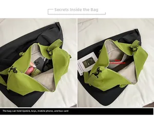 Détail du sac de voyage vert fluo spacieux montrant sa grande capacité intérieure