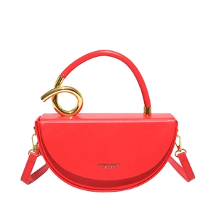 Red leather semi-circle crossbody bag with unique gold metallic spiral handle and logo