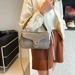 Gray leather crossbody bag with woven texture handle and silver C-logo metal buckle
