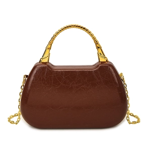 Vintage brown leather box bag with bamboo metal handle and gold chain shoulder strap