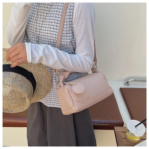 Pink litchi leather Boston bag with MEIFENGER embossing and detachable shoulder strap