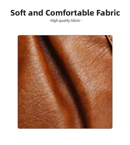 Close-up of the deep brown leather texture and soft high-quality fabric on the tote bag