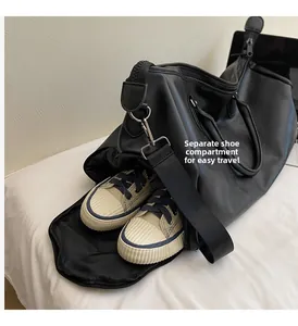 Detail view of large travel bag featuring a side zipper compartment for shoe storage