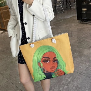 Fashionable yellow canvas tote bag with girl print and thick cotton rope handles