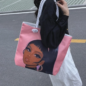 Pink canvas tote bag with black girl art print and white rope handles for beach shopping
