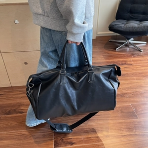 Large black PU leather travel bag with adjustable strap for fitness and short trips