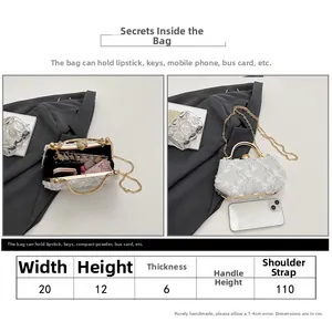 Detail view of white lace evening bag showing interior capacity for phone and lipstick