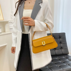 Chic mustard yellow rectangular leather handbag with gold oval twist lock for women