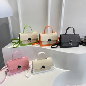 Fashionable color-block canvas crossbody bags with metal twist lock in five colors