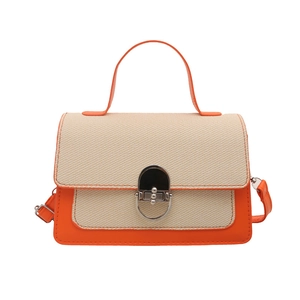 Fashionable orange and white color-block small square bag with silver metal swivel lock