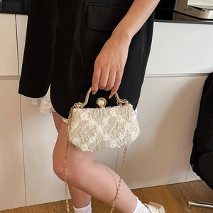Elegant white lace evening box bag with floral applique, gold handle and pearl clasp